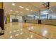 Well-maintained basketball court with glass windows for natural light and spectator viewing at 7161 E Rancho Vista Dr # 1013, Scottsdale, AZ 85251