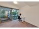 Bedroom with large window, study nook, and neutral color scheme at 7161 E Rancho Vista Dr # 1013, Scottsdale, AZ 85251