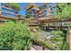 Beautiful condominium exterior featuring manicured landscaping and unique architecture at 7161 E Rancho Vista Dr # 1013, Scottsdale, AZ 85251