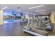 Bright fitness center featuring cardio equipment and a view of the indoor pool at 7161 E Rancho Vista Dr # 1013, Scottsdale, AZ 85251