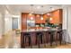 Modern kitchen with stainless steel appliances, sleek countertops, and breakfast bar at 7161 E Rancho Vista Dr # 1013, Scottsdale, AZ 85251