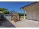 Private backyard features an above-ground pool and a storage shed, perfect for relaxation and activities at 717 E Temple St, Chandler, AZ 85225
