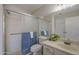 Traditional bathroom with tile flooring and shower with glass doors at 717 E Temple St, Chandler, AZ 85225