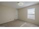 Bedroom with carpet and neutral walls with a window at 717 E Temple St, Chandler, AZ 85225