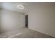 Bedroom with carpet and neutral walls leading to another room at 717 E Temple St, Chandler, AZ 85225