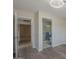 Bedroom with wood floors leading to an attached bathroom at 717 E Temple St, Chandler, AZ 85225