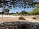 Community park with volleyball and basketball courts and open green space at 717 E Temple St, Chandler, AZ 85225