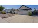 Charming single Gathering home features a two car garage and mature landscaping at 717 E Temple St, Chandler, AZ 85225