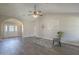 Inviting living room with wood floors, light walls, and a large front door at 717 E Temple St, Chandler, AZ 85225