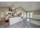 Open-concept kitchen and living space with vaulted ceilings and plenty of natural light at 717 E Temple St, Chandler, AZ 85225