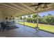 Inviting covered patio with ceiling fans and outdoor seating, perfect for relaxing and enjoying the backyard views at 717 E Temple St, Chandler, AZ 85225