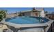 Refreshing above-ground pool in a private backyard, ideal for enjoying sunny days and outdoor fun at 717 E Temple St, Chandler, AZ 85225