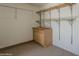 Versatile garage space with shelving and storage cabinets to keep you organized at 717 E Temple St, Chandler, AZ 85225