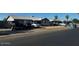 Neighborhood view featuring well-maintained homes and street parking at 7808 W Clarendon Ave, Phoenix, AZ 85033