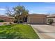 Charming single-Gathering home featuring a well-manicured lawn and a two-car garage in a desirable neighborhood at 8237 W Alex Ave, Peoria, AZ 85382