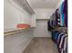 Walk-in closet with shelving and clothing racks provides ample storage space at 8237 W Alex Ave, Peoria, AZ 85382