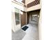 Inviting townhome entrance with a private patio area and security gate at 8625 E Belleview Pl # 1070, Scottsdale, AZ 85257