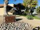 Charming front yard featuring a rock garden and clear house number at 8625 E Belleview Pl # 1070, Scottsdale, AZ 85257