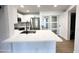 Modern kitchen with stainless steel appliances, white countertops, and sleek cabinetry at 8625 E Belleview Pl # 1070, Scottsdale, AZ 85257