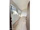 Bright living room with wood floors, fresh paint, and large windows at 8625 E Belleview Pl # 1070, Scottsdale, AZ 85257