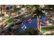 Scenic view of a Scottsdale waterfront with lush landscaping and whimsical light displays at 8625 E Belleview Pl # 1070, Scottsdale, AZ 85257