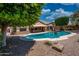 Inviting backyard oasis with a refreshing pool perfect for enjoying sunny days and outdoor gatherings at 8765 W Custer Ln, Peoria, AZ 85381