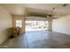 Spacious garage with ample storage and a view of the neighborhood, offering convenience and functionality at 8765 W Custer Ln, Peoria, AZ 85381