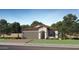 Charming single-story home with a two-car garage, tile roof, and well-manicured lawn at 9833 W Avalon Dr, Phoenix, AZ 85037