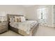 Comfortable bedroom with soft lighting, and plush bedding creating a relaxing atmosphere at 10520 E Thorite Cir, Mesa, AZ 85212