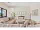 Comfortable living room features neutral tones, natural light, and stylish decor at 10520 E Thorite Cir, Mesa, AZ 85212