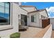 Private patio with lounge chair and paved flooring, offering a peaceful outdoor retreat at 10520 E Thorite Cir, Mesa, AZ 85212