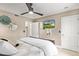 Bedroom featuring a ceiling fan, TV, and neutral décor at 10658 E Cinnabar Ave, Scottsdale, AZ 85258