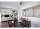 Warm dining area showcasing open layout, living room access, and modern decor at 12107 N 66Th Ave, Glendale, AZ 85304