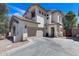 Inviting two-story home with a two-car garage, neutral stucco facade and well-maintained landscaping at 12107 N 66Th Ave, Glendale, AZ 85304