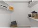 Walk-in closet with ample shelving and storage space at 13621 N 98Th Ave # E, Sun City, AZ 85351