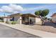 Charming single-story home featuring low-maintenance landscaping and a cozy screened-in porch at 13621 N 98Th Ave # E, Sun City, AZ 85351
