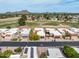 Expansive aerial shot of the neighborhood with houses backing up to a beautiful golf course and mountain views at 14247 N 2Nd Ave, Phoenix, AZ 85023