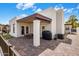 The home's backyard features a covered patio and a grill, perfect for entertaining at 14247 N 2Nd Ave, Phoenix, AZ 85023