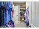 Organized walk-in closet providing ample storage for clothing and shoes at 14247 N 2Nd Ave, Phoenix, AZ 85023