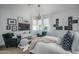 Bright bedroom with stylish furnishings, modern decor, lots of natural light, and neutral color palette at 14870 W Encanto Blvd # 2123, Goodyear, AZ 85395