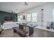Stylish dining area open to living space in modern home at 14870 W Encanto Blvd # 2123, Goodyear, AZ 85395