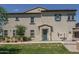 Charming stucco townhouse with desert landscaping and a private entrance at 14870 W Encanto Blvd # 2123, Goodyear, AZ 85395