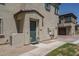Charming home exterior with a landscaped entrance, a well-lit walkway, and tasteful design at 14870 W Encanto Blvd # 2123, Goodyear, AZ 85395