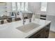 Spacious kitchen island with modern sink and stylish decor at 14870 W Encanto Blvd # 2123, Goodyear, AZ 85395