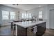 Open concept kitchen with island seating and stylish finishes in the townhouse at 14870 W Encanto Blvd # 2123, Goodyear, AZ 85395