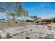 Community basketball court with trees, shade, and clear blue skies at 16103 W Redfield Rd, Surprise, AZ 85379