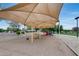 Well-shaded community playground with swings and slides at 16103 W Redfield Rd, Surprise, AZ 85379