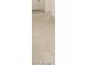 Close-up of light tile floors with a wood-grain pattern at 17409 W Eva St, Waddell, AZ 85355