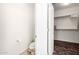 Toilet and partial view into the walk-in closet at 17532 W Copper Ridge Dr, Goodyear, AZ 85338
