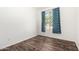 Bedroom with window and blue curtain at 17532 W Copper Ridge Dr, Goodyear, AZ 85338